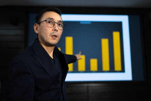 istock Professional presenting data in a business meeting with a projection screen 2187838882