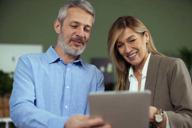 istock Accomplished entrepreneurs cooperating on a joint initiative 2187846413