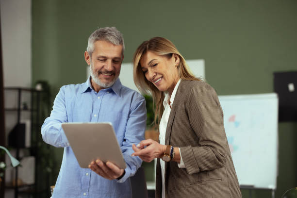 istock Two business experts brainstorming ideas for growth 2187846416