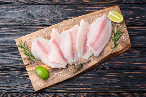 istock Raw tilapia fillet photography . Top view 2187848044