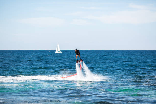 istock Fly board rider in the ocean 2187851397