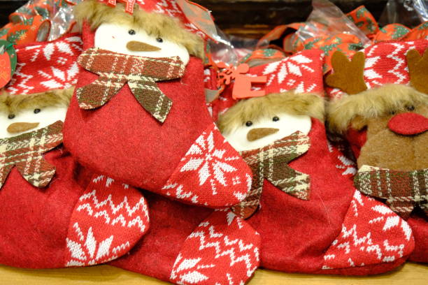 Christmas decorative boxes gifts on the counter in the supermarket. Preparing for Christmas