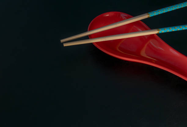 Equipment for eating is placed on a white background.