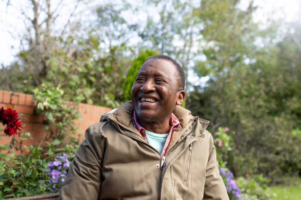 istock Smiling Man Sitting in the Garden 2187858465