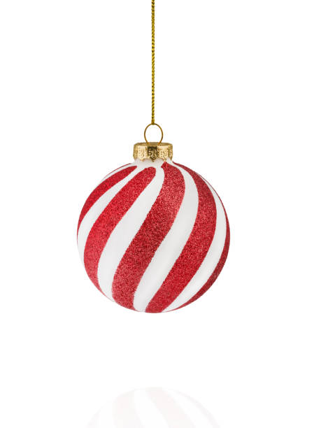 istock White and red glittering Christmas ornaments ball with featuring stripes and dot or circle isolated on white background with clipping path. Design element. 2187859736