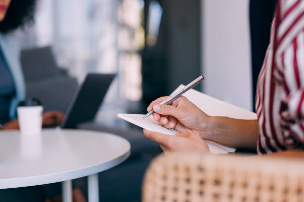 istock Business Meeting with Focus on Note Taking and Collaboration 2187866190