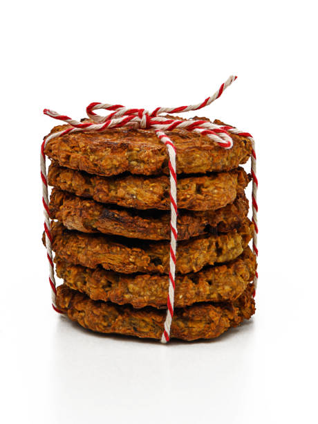 istock Delicious stacked cookies tied with red and white string for a delightful gift. Generative AI 2187866511