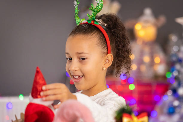istock Christmas time decoration is this kid's favorite 2187868585