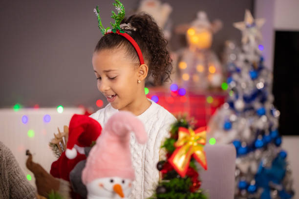 istock Christmas time decoration is this kid's favorite 2187869193