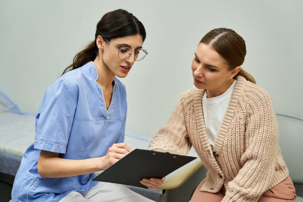 istock Gynecologist consults with patient in a modern clinic setting 2187869518