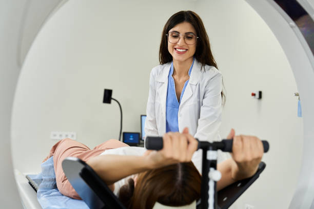 istock Radiologist guides patient through mri procedure in advanced clinic setting 2187870808