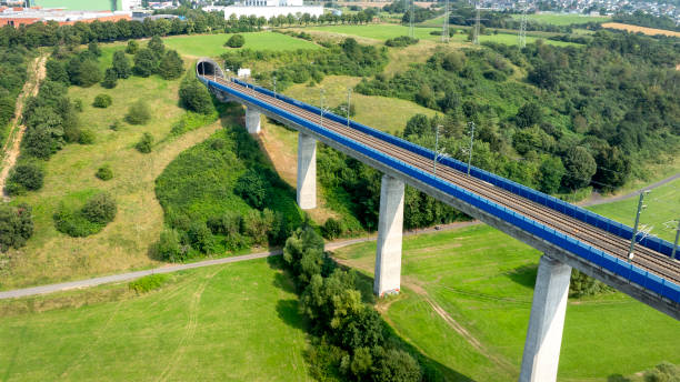 istock Railway bridge over river - aerial view 2187871436