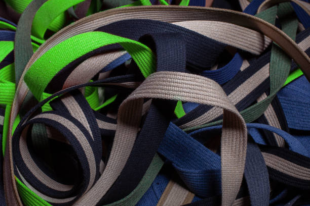 istock Tangled colorful textile strips, close up. 2187871613