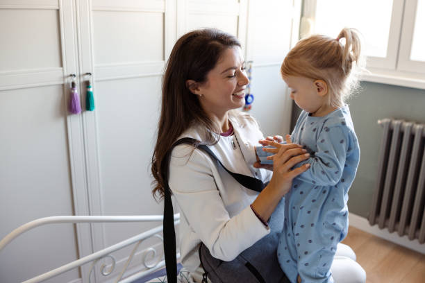 istock Mother bonding with toddler before going to work in the morning 2187874307