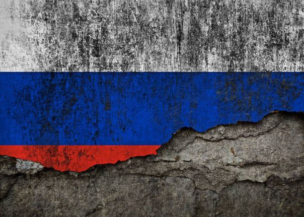 istock Russian Flag in Grunge Style, Paint on Damaged Rough Wall Background 2187875945