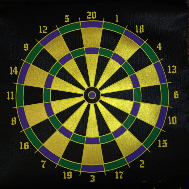 istock Black and yellow dartboard divided into sectors. Special round dartboard for hitting darts for darts. 2187877874