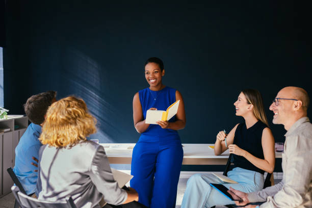 istock Diverse Team Engaged in a Collaborative Office Meeting Session 2187877902