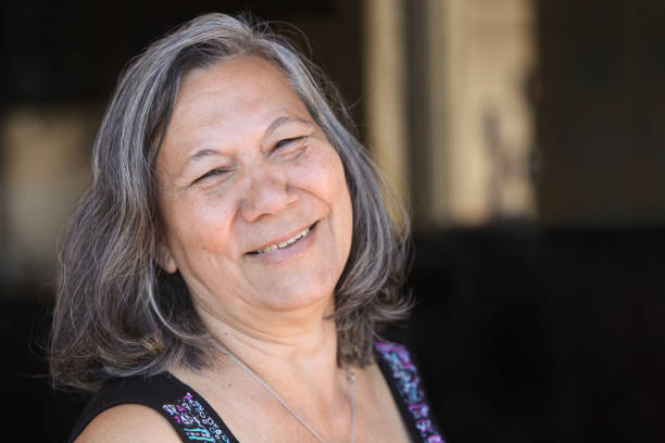istock cheerful  senior latino woman 2187879194