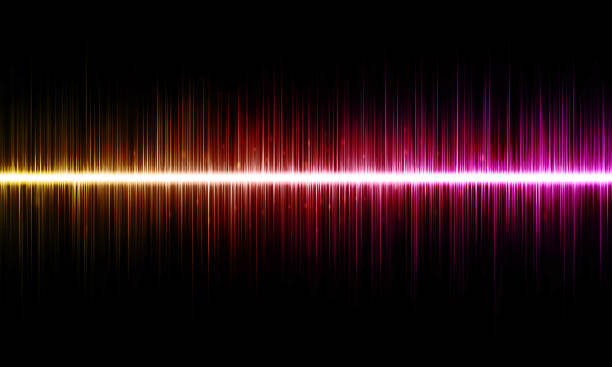 istock A yellow-red sound wave on a black background. 2187886676