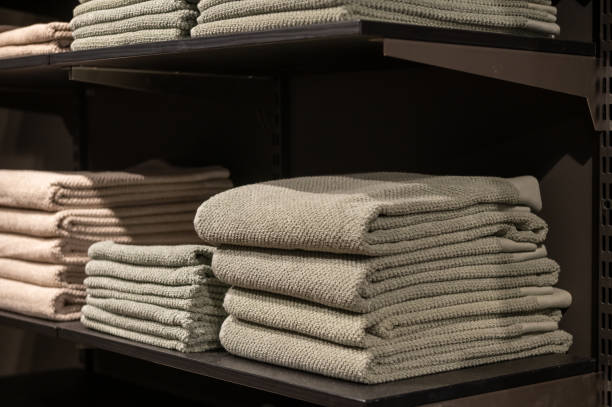 Neatly Folded Towels on a Store Shelf
