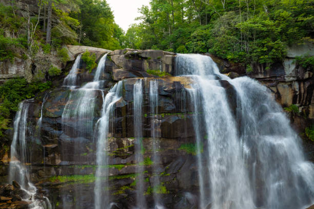 istock Amazing summer landscape with forest river waters falling down in big waterfall with clear water between rocky boulders in Nantahala National Forest. Whitewater Falls, North Carolina, USA 2187894234