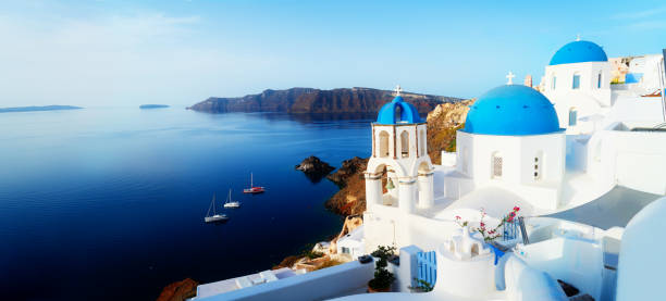 istock white belfries Santorini island, Greece 2187894743