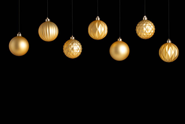 istock Hanging golden matt Christmas balls with different texture on black background 2187896625