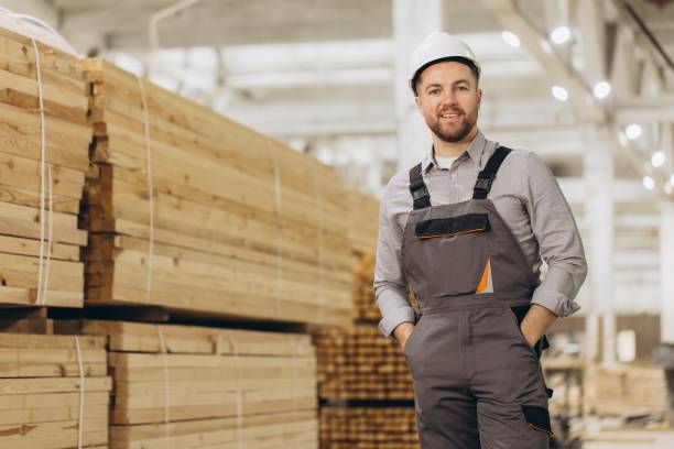 istock Supervisor smiling at lumber warehouse for modular building industry 2187897742