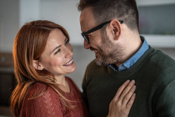 istock Wrapped in love - A couple's warm embrace 2187900974