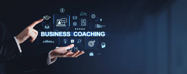 istock Hands interacting with virtual business coaching icons in a futuristic digital interface. 2187902336