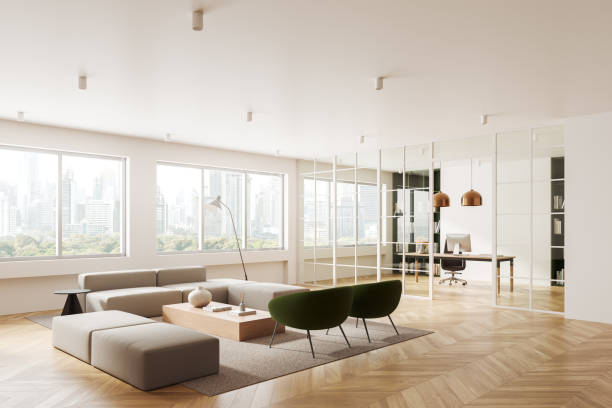 istock Modern business interior with relax place, work desk and panoramic window 2187903974