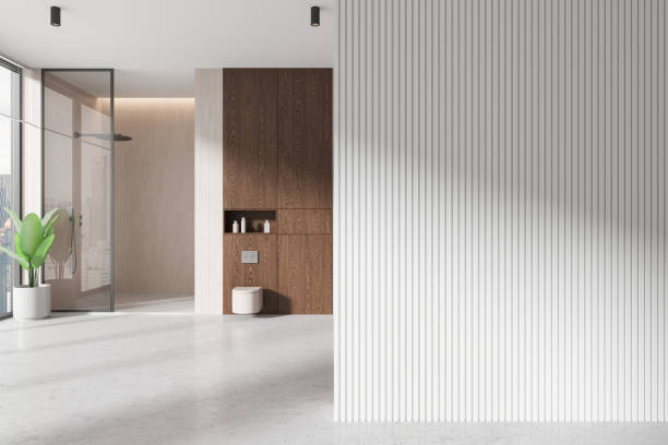 istock Modern bathroom interior with wooden cabinets and vertical striped wall. 3D Rendering 2187904101