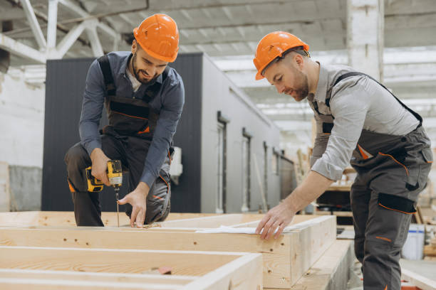 istock Construction workers building wooden frame in factory for modular building 2187904120