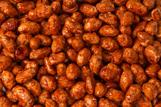 istock Tasty sweet roasted peanuts as a background. 2187904194