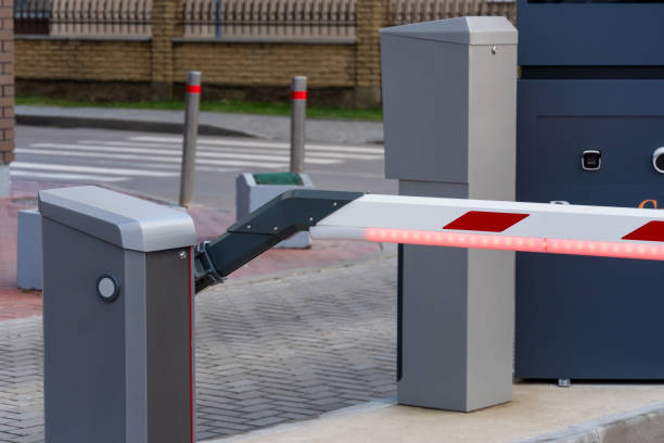istock The automatic parking barrier is closed, effectively controlling access to the facility. Positioned at the entrance, it enhances security and enforces boundary regulations for vehicles 2187904849