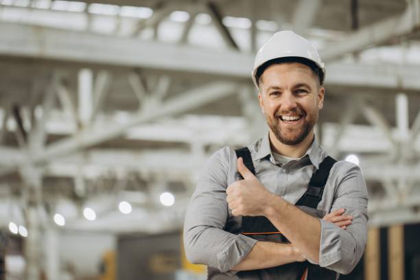 istock Smiling engineer gesturing thumbs up in modular building factory 2187905040