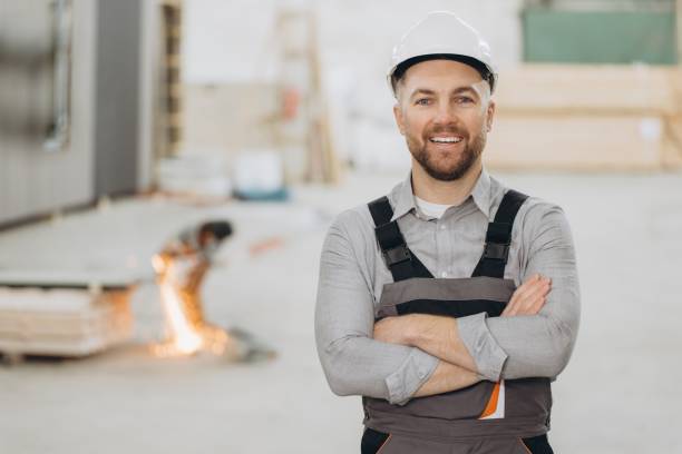 istock Construction worker smiling with crossed arms in modular building industry 2187905206