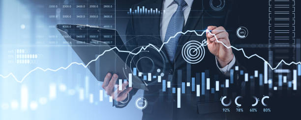 istock Man pen touch forex diagrams and stock market data with dashboard 2187905639