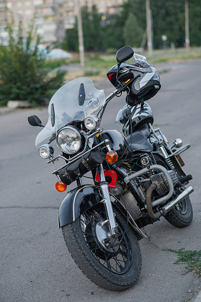 istock heavy classic motorbike on a stand. vertical 2187913138