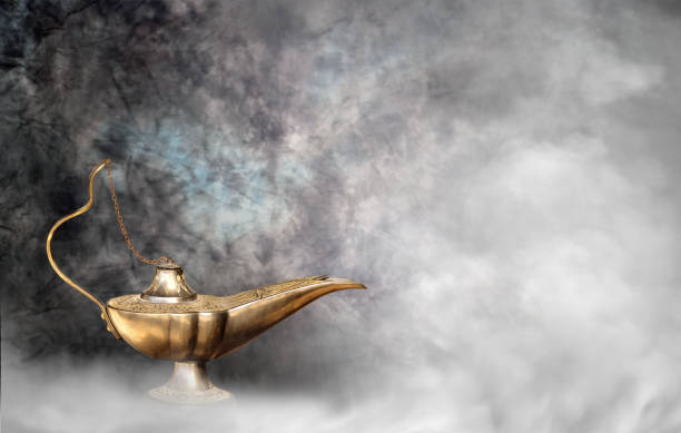 istock Aladdin magic lamp in smokes, antique wish lamp 2187915225