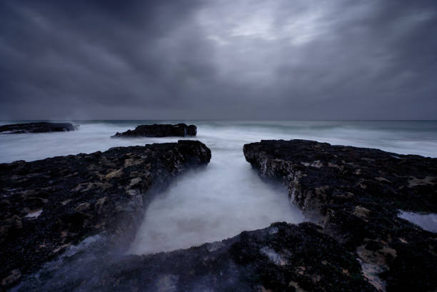 istock Refuge from the rocks under the gray sky 2187917819