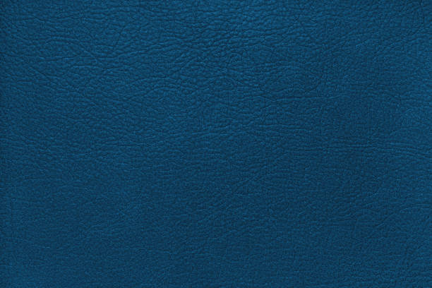 istock Natural, genuine solid blue leather texture, structure of matte leatherette macro background 2187925079