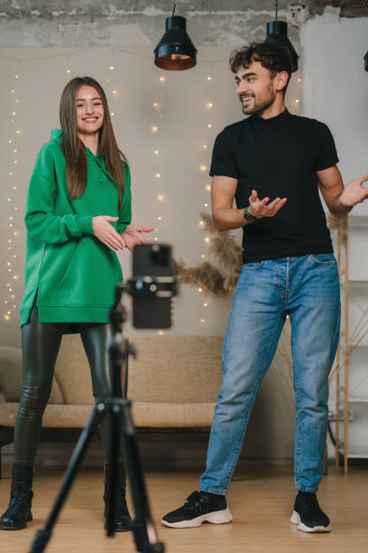 istock A group of young creators enthusiastically filming content together inside a cozy studio space 2187927222