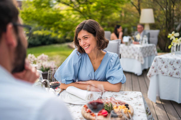 istock Diverse Couple Enjoying Outdoor Dining Experience 2187929114