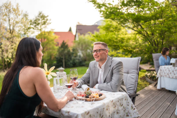 istock Caucasian Couple Enjoying Outdoor Dining 2187929118