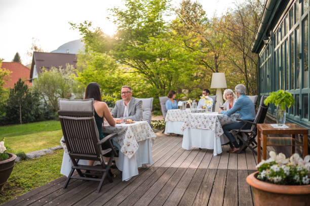 istock Diverse Group Enjoying Meal on Hotel Terrace 2187929127