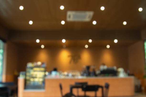 istock Abstract blur interior coffee shop restaurant or cafe and kitchen for background, counter top on of clean abstract home indoor. Warm tone used for display or montage your food dining banner products. 2187929170