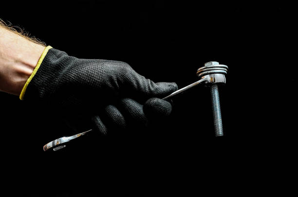 istock One Key bolts and a Hand 2187942938