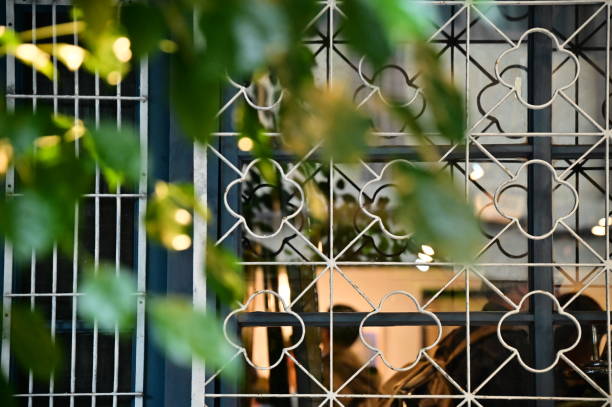 A close-up of Chifeng Street's window grilles in Taipei highlights the charm of this historic alley. Known for its artistic vibe, the street’s old houses showcase Taipei's heritage and craftsmanship.