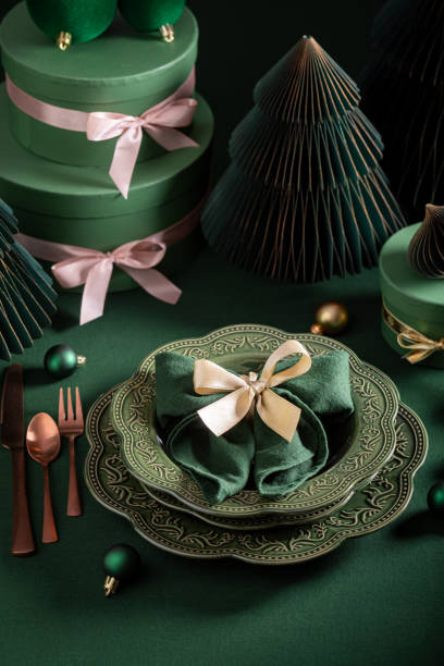 istock Beautiful dark green table set for Christmas with baubles. 2187945235
